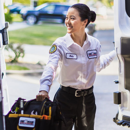Person Grabbing Bag Of Equipment